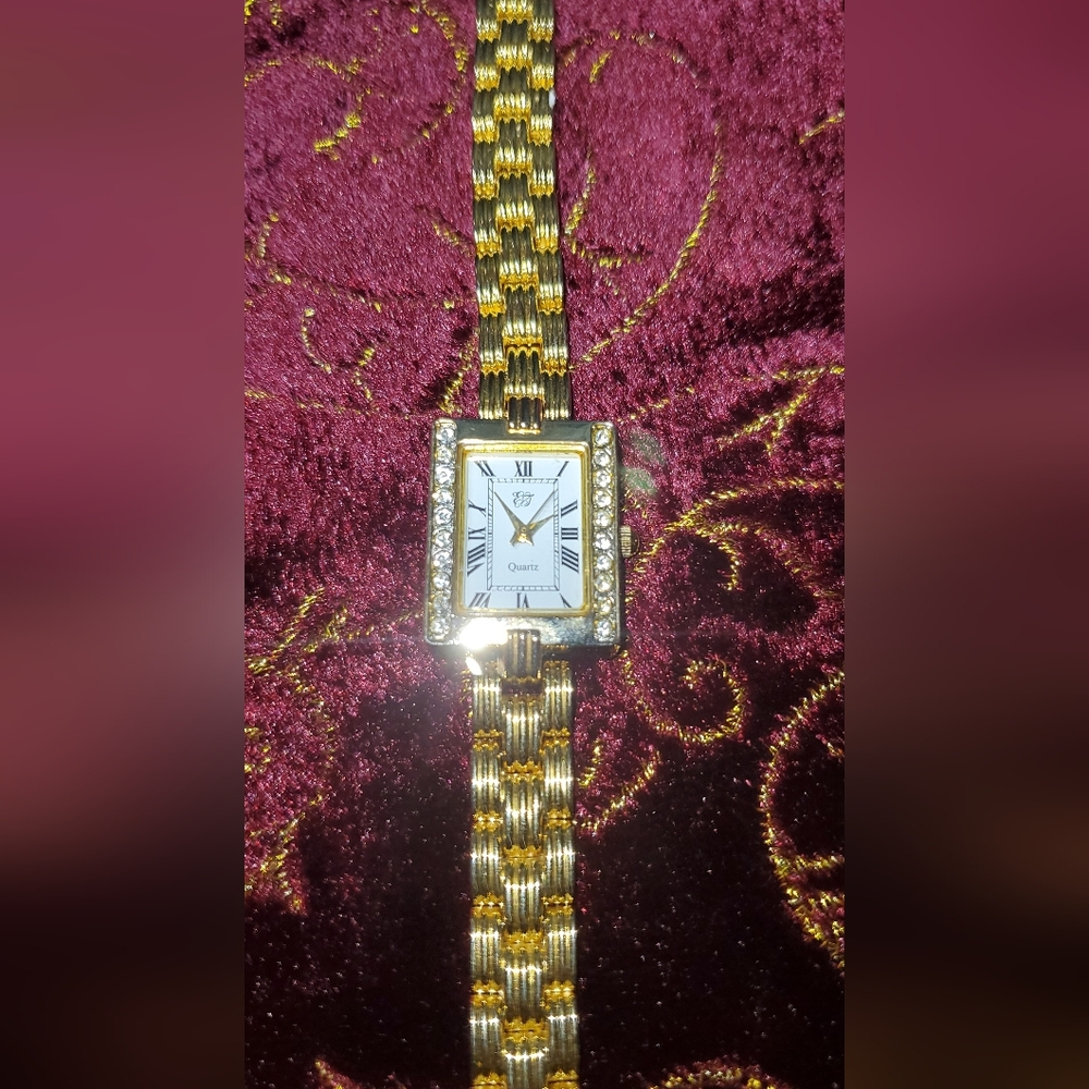 Elegant Women's Gold and Silver Watch with Crystal Details